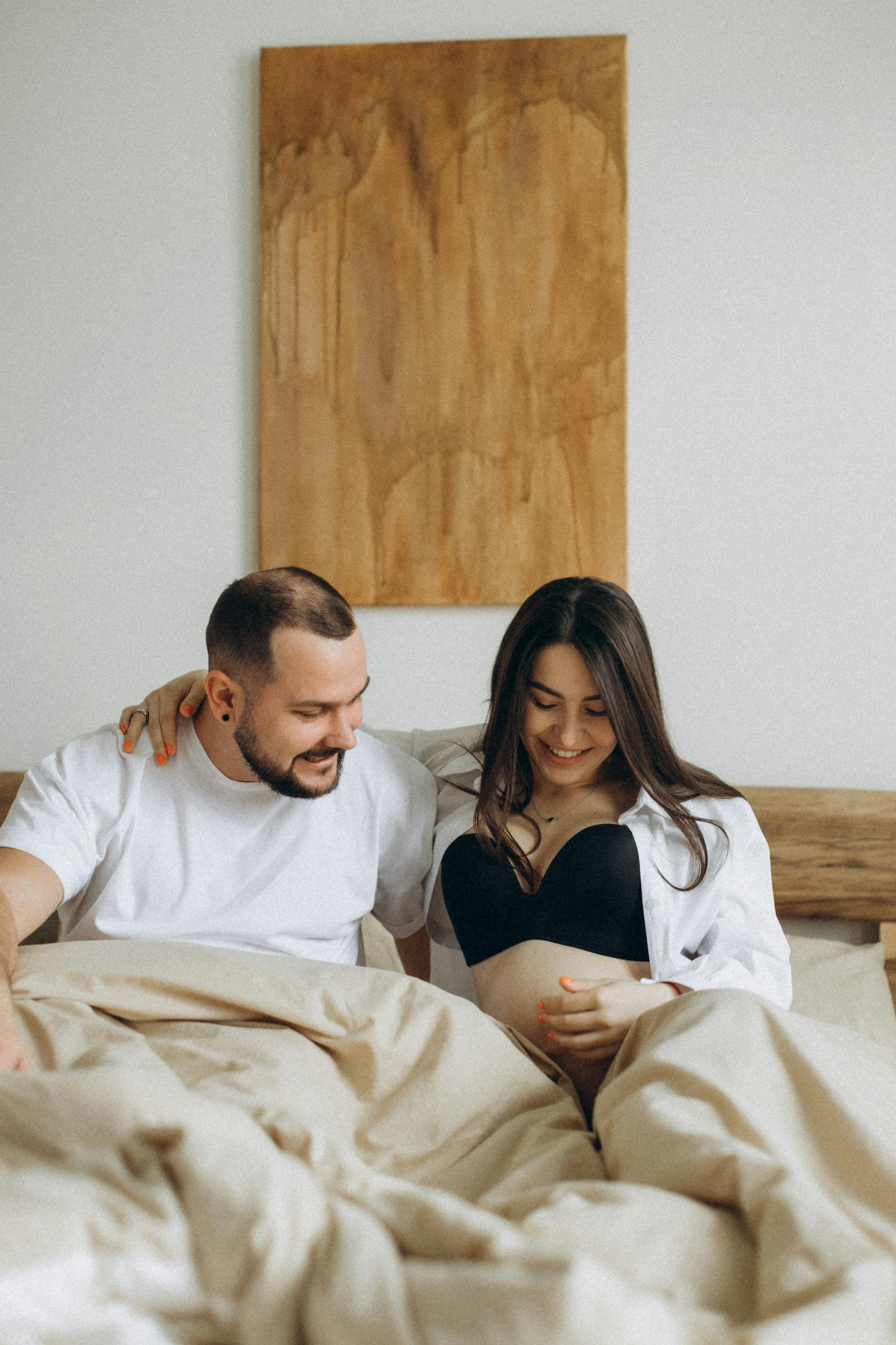 How to Share a Bed With a Pregnancy Pillow (Without Kicking Your Partner Out)